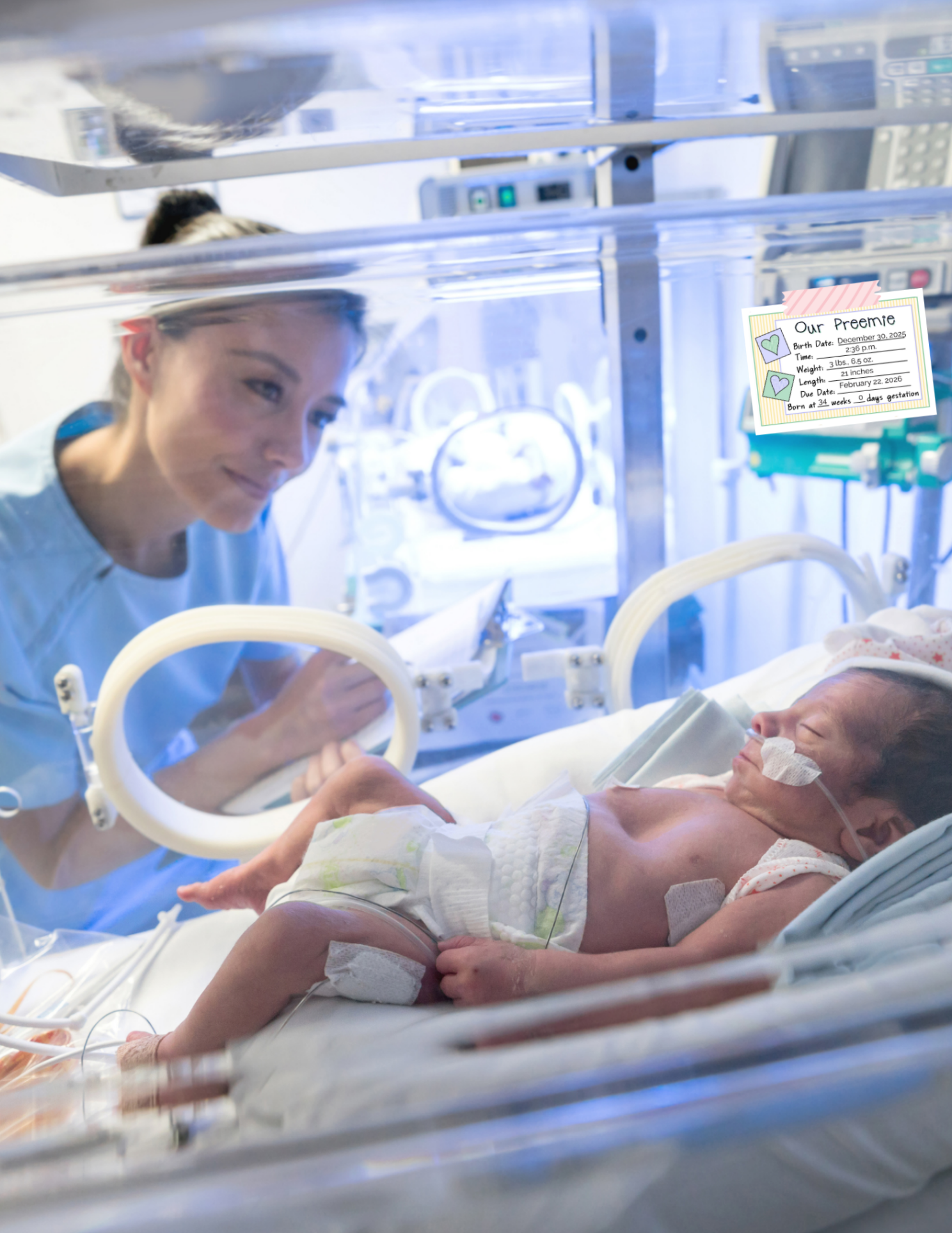 Nurse attending to a baby in an incubator with medical equipment in the background